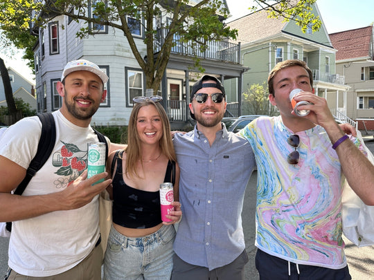Friends drinking cans of Shimmerwood CBD seltzer